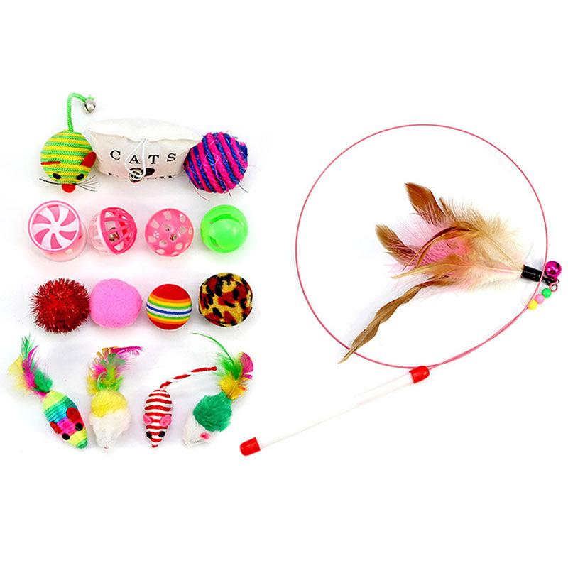 The Play Pack’s feather wand and smaller toys laid out together